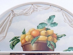 Lunetta con cesto di limoni e arance